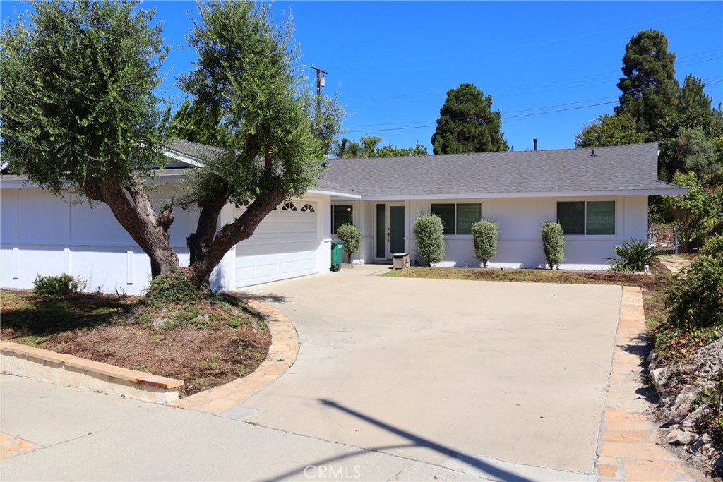 This adorable house has been updated and restored to the charm of extensive remodels made a few years ago for the owners’ pleasure. Great open floor plan encompasses the living/family rooms and cleverly designed kitchen, which includes a center island with a cooktop, oven and microwave drawer. Wood flooring, bathrooms and windows are all modern. Separate laundry room (washer and dryer are included with no warranty). This time, the new tenant will appreciate new roof, newly painted exterior walls, new water heater and more. Both front and back yards will be soon grassy as seeds have been sown. The 10,678sf lot provides a very spacious backyard where trees and bushes have been handsomely pruned and trimmed. Located in the popular Vista Grande Elementary school area; Peninsula Shopping Centre, Ralphs, Hesse Park and other daily needs are all close. This charming house is ready for a new qualified tenant (730+). Come and see the house! You will love it. Yards will soon be beautiful with new lawn.