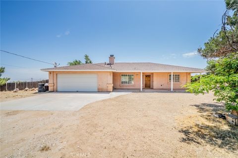 Photo of 8417 Ailanthus ST, Phelan, CA 92371 (MLS # IV26106646)
