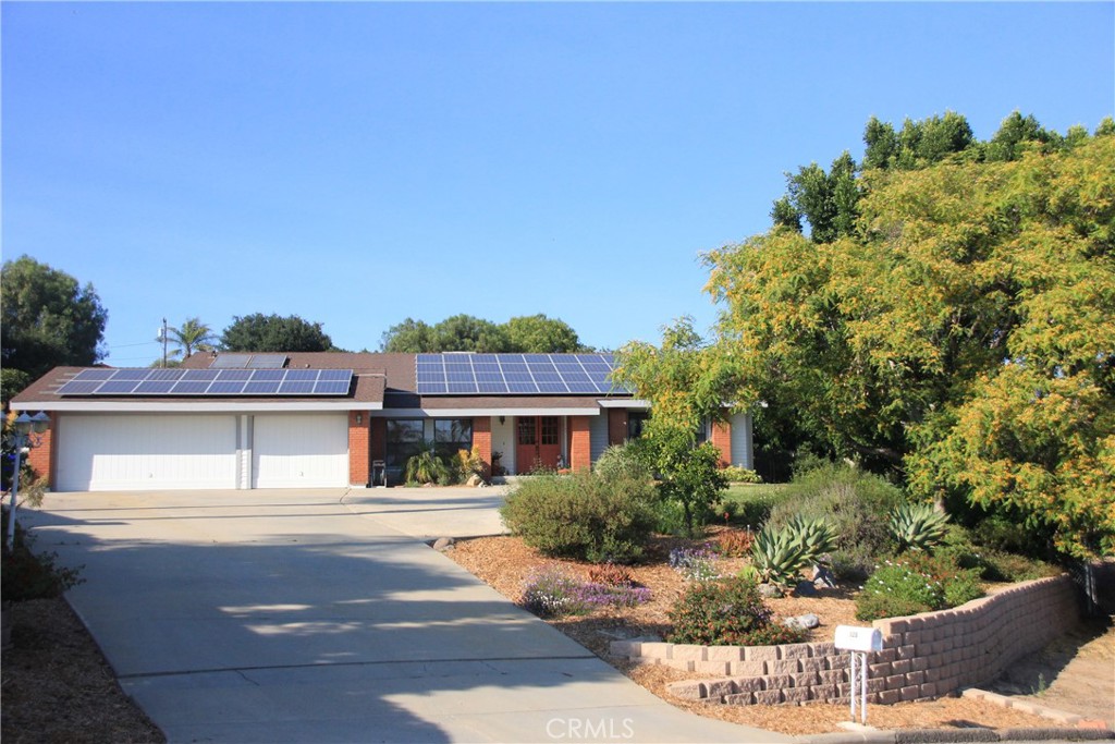 This ranch style/rambler home has endless potential with over an acre in a sought-after Escondido neighborhood. Discover the possibilities of this 1.15-acre property with lots of options including possible ADU. Home is located within walking distance to Felicita Park, endless trails within 10 minutes driving at Lake Hodges/ San Dieguito River Park. Easy access to the I-15 freeway, North County Mall and the historic Escondido downtown area with a variety of dining and entertainment.
Beautifully designed yard with many mature trees including an orchard with citrus, fruit trees and vegetable boxes for growing your food.
The interior is an open design including a game room with pool table. Large bedrooms, an office, living room, dining room and large kitchen with ample cabinets for storage. The primary suite includes its own private bathroom with shower and bathtub and a large walk-in closet. The primary bedroom also has a large retreat/library area. Sliding glass doors allow easy access to the in-ground pool/hot tub area. Large, covered patio off the kitchen/game room offers many hours of entertainment with loved ones.
Property has a flat area in the rear area for RV parking which includes access to water and electric hookups. As well there is ample parking in front of the property. The home has a large solar array which generates lots of free electricity!