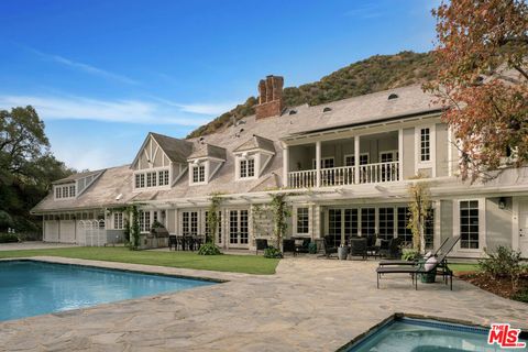 Photo of 1420 Moraga Drive, Los Angeles, CA 90049 (MLS # 25518613)
