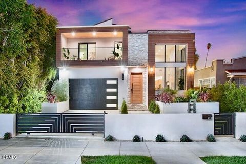 Photo of 244 S Gramercy Place, Los Angeles, CA 90004 (MLS # P1-27137)