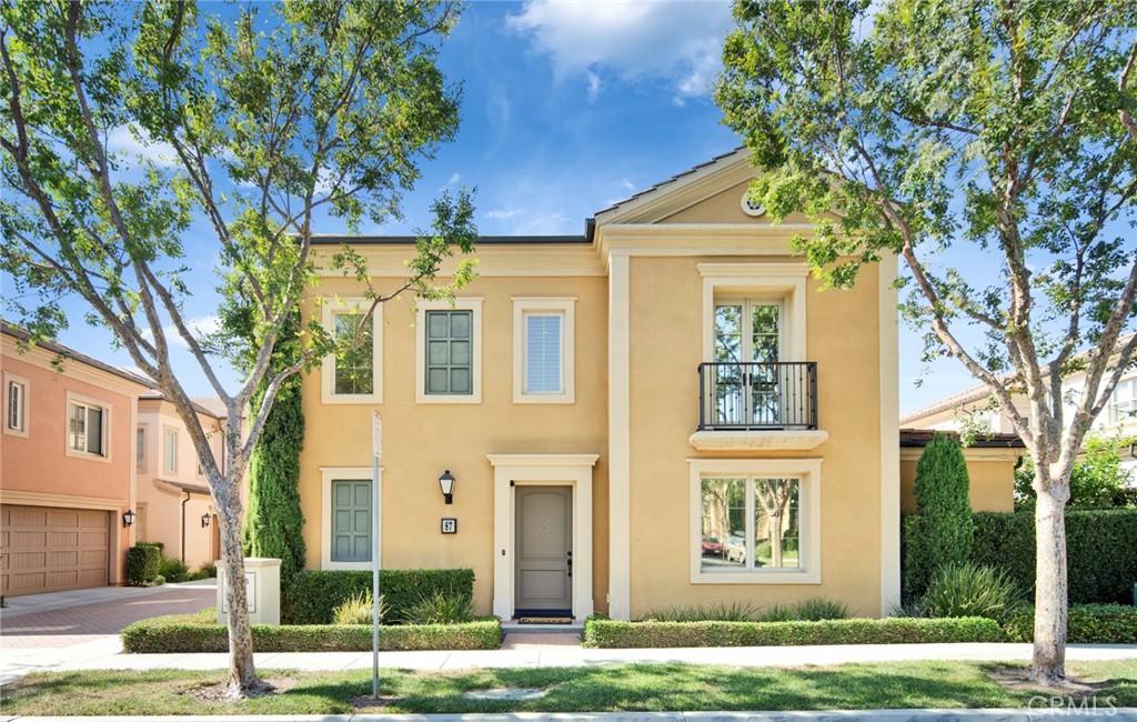 Welcome to 87 HANGING GARDEN, located in the heart of CYPRESS VILLAGE, IRVINE. This Bright and Inviting Corner Home offers 3 bedrooms, 2.5 bathrooms and a loft with a desirable SOUTHEAST-facing orientation, LOW HOA FEE and LOW MELLO-ROOS. This open-concept layout features a spacious living room with large sliding doors, recessed lighting and elegant pendant lighting, and a gourmet kitchen with a spacious chef's island and a walk-in pantry, perfect for entertaining and relaxing. The dining area that accommodates a large dining table is filled with natural light from the expansive windows, creating an ideal space for hosting guests. Over $70K in UPGRADES including White Custom Cabinetry, Engineered Wood Flooring, Premium Carpet, Plantation-style Wood Shutters, Elegant Crown Molding throughout the first floor, and White or Pewter-Framed Custom Mirrors in both upstairs bathrooms. The Beautifully Landscaped Backyard with a California Room provides the ideal space for barbecues and gatherings with low-maintenance care. Upstairs, the loft offers flexibility for a home office, gym, or additional living space. The Spacious Master Suite boasts abundant Natural Light from the expansive french doors, and a Luxurious En-Suite Bathroom with dual sink, a soaking tub, separate shower, and a walk-in closet. Two additional guest bedrooms and a bathroom, complete with dual sinks and a bathtub, providing both comfort and convenience. Located within award-winning Irvine school district, residents enjoy access to numerous community amenities including parks, trails, resort-inspired pools, playgrounds, sports courts and open spaces. This home is just minutes away from Cypress Village shopping center, Woodbury Town center, Irvine Spectrum, dining, renowned educational centers, and more, offering the perfect blend of luxury and convenience. Don't miss this opportunity to experience the best of Irvine living!