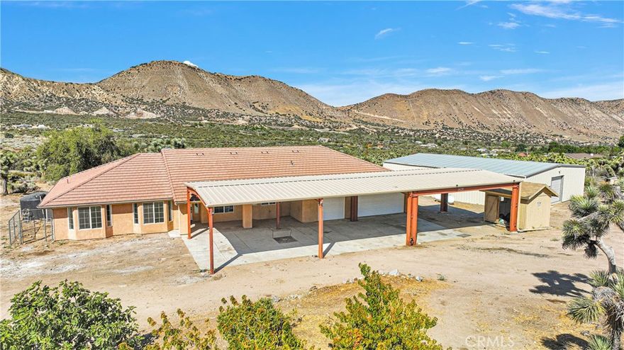 PRIME OPPORTUNITY IN THE DIGITAL AGE – RURAL WELLNESS MEETS BUSINESS POTENTIAL!!!

Welcome to 4426 Oil Well Rd, Phelan – a rare 5.68-acre estate perfectly positioned for those seeking tranquility, economic stability, and entrepreneurial opportunities in the era of digital transformation. This property uniquely combines residential comfort with substantial commercial potential. RESIDENTIAL FEATURES: •Elevated ridge-top location with panoramic mountain views and complete privacy. •2,395 SF main home: 4 bedrooms, 2 baths. •4 additional functional rooms: office/den, walk-in closet, food pantry, laundry room. •200 Amp electrical panel. •Well-maintained interior with quality finishes. COMMERCIAL/BUSINESS POTENTIAL: •3,000 SF passive warehouse with concrete flooring, steel H-beam ceiling structure, and three separate sections. •400 Amp electrical panel – ideal for logistics, e-commerce fulfillment, or manufacturing. •20 FT high commercial carport with steel H-beam construction. WATER SYSTEMS:• Private well for independent water supply. •7,000-gallon water storage tank

 Smart Farming Potential: •Well water is available on site. (With an appropriate filtration system RO is recommended to remove detected minerals), the water is suitable for smart farming operations, including mushroom cultivation and specialty crop cultivation. It is ideal for controlled environment farming, Water quality testing and treatment are required before use for agricultural purposes.

LOCATION ADVANTAGES: •7 miles from HWY 138 exit off HWY 15 – excellent accessibility. •Situated in sought-after "West Cajon Valley" area, known for established families and economic stability. •3 miles to HWY 2 leading to Wrightwood Ski Resort. •Easy access to Angeles Crest Highway scenic drives and mountain recreation.

This is more than a home – it's a lifestyle and business opportunity. Properties in this desirable area rarely become available. Don't miss your chance to own this versatile estate where mountain serenity meets commercial possibility!!!