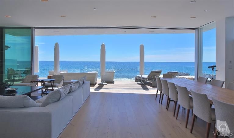 Stunning newly completed home in 2014. Downstairs and upstairs rear walls of the home completely open up and its absolutely spectacular. Its a Very special home. High style and incredibly chic. This is the Super Cool Malibu home your clients want. Steps to the beach. Took five years to complete. Italian kitchen cabinetry and over-sized floating hinge doors. Everything is just First Class!! Fantastic location in the center of Malibu near shops, restaurants and the all the activities.
