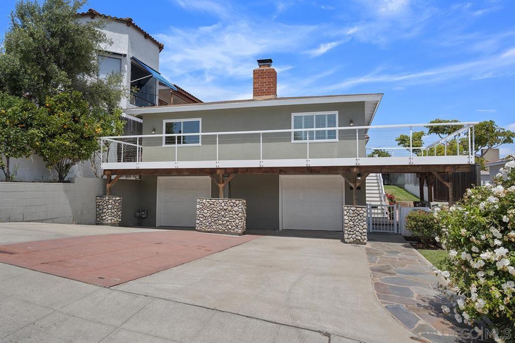 Why settle when you can have it all? Stunning bay views, quiet neighborhood away from the flight path, entertaining view deck + grassy fenced yard, and oversized garage with tons of storage, all in one of Point Loma’s most desirable pockets! This beautifully updated home in the Roseville–Fleet Ridge neighborhood is just blocks from the marina, shops, and dining. Additional highlights include hardwood floors, A/C, cozy fireplace, and dual-pane windows. The elevated layout offers the convenience of single-level living, including laundry and yard all on one level, and an oversized 2+ car garage below. You'll have plenty of extra room for a golf cart, kayak, paddle boards, and all the hobbies you can dream up. Major upgrades include a 200-amp panel, newer copper water lines, and an ABS sewer main under the house (2023). Don’t miss this move-in-ready gem in a prime location!