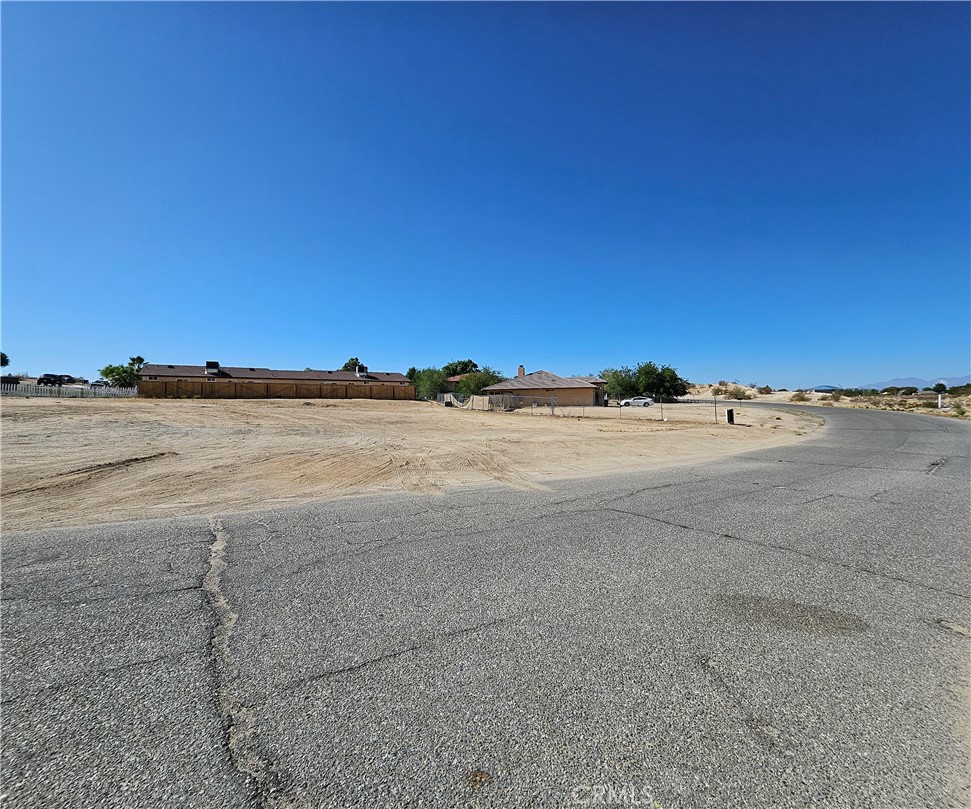 Multi-unit Zoning Corner lot in Victorville (Buyer must verify all information with the city of Victorville, including, but not limited to Zoning, Utilities, Lot size, Property Boundaries, Permits, etc; prior to purchase) . This is a great corner lot, in an established neighborhood, rural living with paved streets and street lights. There are some Single Family homes and multi-units around this property. It seems like most of this dwellings are on a septic systems. This lot offers the convenience of accessing I-15 FWY within a few minutes via Village Drive. There are schools nearby as well as shopping places and and public transportation. A City bus stop is located near the property. Seller is willing to finance the purchase with $25,000.00 down payment, balance to carry Interest of 8.5% for 3 years (36 monthly payments of approximately 1259.54 to pay off balance) No credit / No Income check, but lenders title insurance must be paid for by the buyer through escrow to protect lender's interest. Owner is a licensed California Real Estate Broker