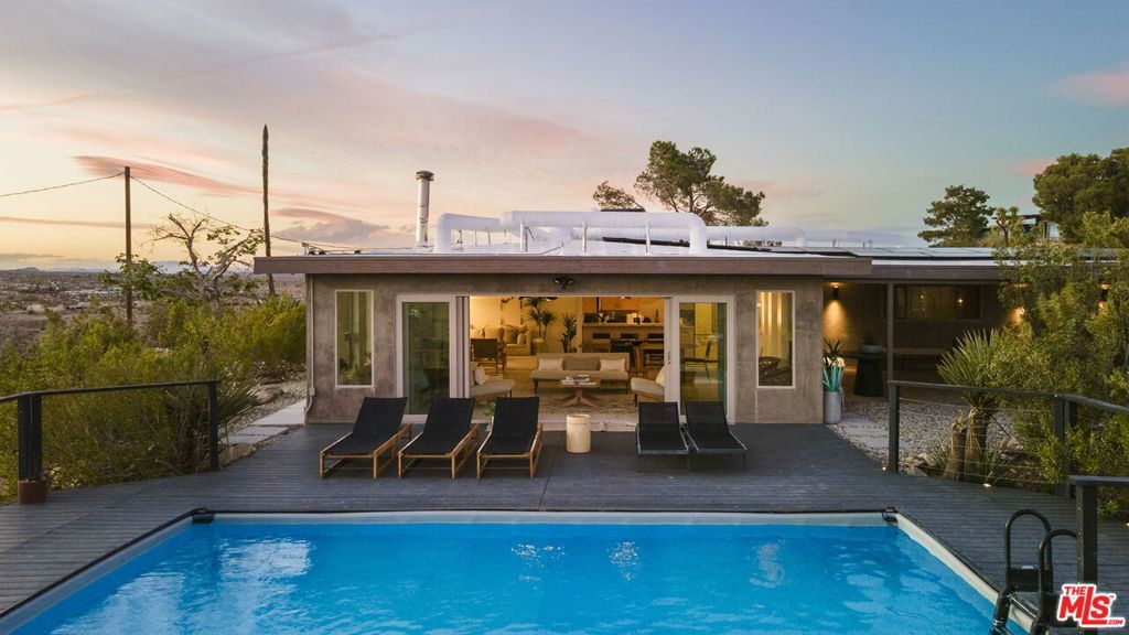 Photo of 59856 Sun Mesa Drive, Yucca Valley, CA 92284 (MLS # 26740637)