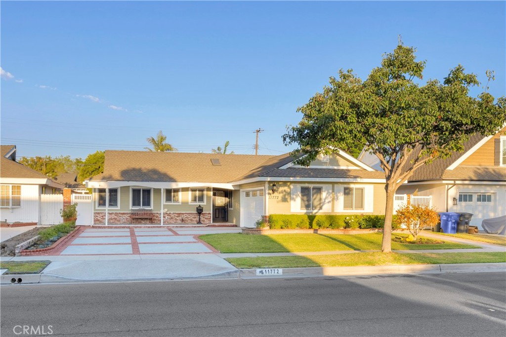 Nestled in the highly sought-after Rossmoor Highlands within the Los Alamitos School District, this beautifully updated & maintained home offers a rare combination of size, functionality, and turnkey appeal. At 2,152 sq ft on a 7,620 sq ft lot, the home features multiple living spaces thoughtfully designed for both everyday living and entertaining.
The formal living and dining areas flow seamlessly to the backyard, where a built-in barbeque complements a shaded outdoor space. Two bedrooms at the front of the house share a guest bathroom, with one bedroom offering its own ensuite. At the back of house, a large family room with an office setup provides serene views of the backyard and barbeque area. The hallway from the family room leads to the primary suite, complete with a walk-in closet, a masterfully tiled bathroom, and private doors opening directly to a private jacuzzi.
Every aspect of the landscaping has been meticulously maintained, creating a welcoming and polished exterior. This home represents a rare opportunity to enter one of Los Alamitos’ most coveted neighborhoods, offering both comfort and the convenience of a prime location.