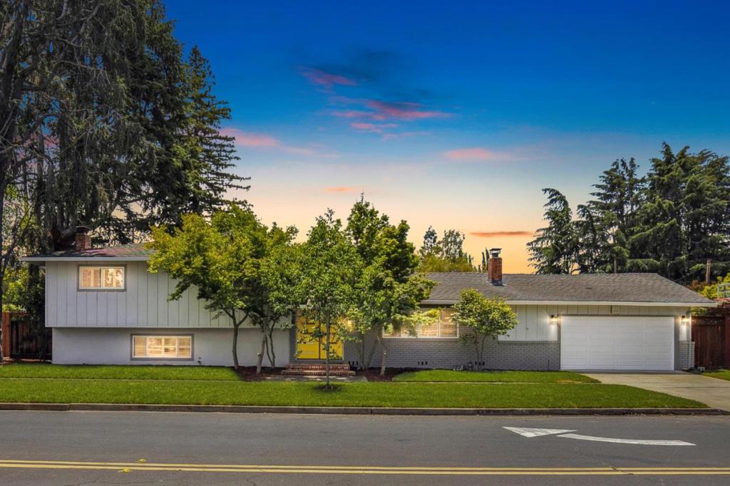 Beautifully remodeled 4-bed, 2.5-bath home with 2,608SF of living space on a 10,362SF lot in one of Campbells most sought-after neighborhoods near the Willow Glen border. Step through double front doors into a vaulted living room with refinished hardwood floors, recessed lighting, and a stunning new electric fireplace. The brand-new kitchen features custom cabinetry, quartz counters, matching backsplash, stainless steel appliances, and a breakfast nook. A formal dining room connects the kitchen and living area. Downstairs offers a spacious family room with wet bar, a guest bedroom, half bath, and laundry room with backyard accessperfect for pool days. Upstairs are 3 oversized bedrooms, including a light-filled primary suite with updated bath. The backyard is an entertainers dream: built-in brick BBQ, fireplace, pool, large lawn, and space for RV/boat parking or a sport court. Close to Pruneyard, downtown Campbell, Willow Glen, parks, trails, and top-rated Branham High. A rare turnkey opportunity!