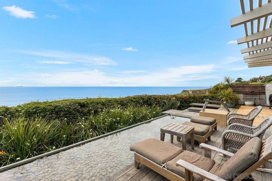 Fully furnished, ocean front monthly rental offered at $25,000/month. Renovated 3 bed, 2.5 bath modern oasis on the oceanfront of the iconic DelMar beach. Stare into the beautiful blue waves of the Pacific Ocean & catch sunsets from the most epic spot on the coast! Enjoy panoramic unobstructed oceanviews throughout. This exceptionally designed property was completed with no detail overlooked. Functional, open floor plan with the very best of indoor / outdoorliving. The family room opens to the gorgeous wood deck complete with jacuzzi, cold plunge, covered outdoor patio space, fire pit, sauna, outdoor shower, beautifulspa-like water feature & more. On the entry level is the kitchen, family room, master bed / bath & secondary bedroom with murphy bed & powder bath. Downstairsyou will find a large bunk room bedroom, full bathroom with tub & laundry room. The garage has been converted into the Murphy bed room so parking includes onecarport space. Do not miss this gorgeous oceanfront gem!