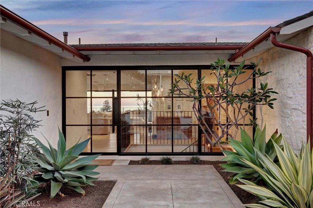 Photo of 4 S Vista De La Luna, Laguna Beach, CA 92651 (MLS # OC26063568)