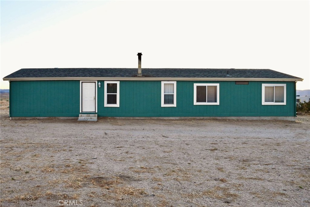 Residential manufactured home great for a first-time home buyer or a retirement getaway home. Located in the small town of Neenach (Lancaster) CA. The home has great mountain views. Built in 1993 and is on a permanent seismic foundation. The property is off the county maintained paved Road of Three Points Rd. and Hwy 138. Fifteen minutes from the 5 Freeway. The home is located on a 2.16 Acre lot and 1,782 sqft of living space. The house features a Spacious kitchen, laundry room, huge Livingroom, 4 Bedroom, 2- bathrooms, 2- car detached garage. Home has been occupied by the same owner for over 30 years. Home is Move-in ready condition, Interior walls freshly painted, original carpet, Lamanite counter tops, wood burning fireplace, and swamp cooler. Beautiful views of the sunset and sunrise. Retreat to a back yard of mountain Views. Peaceful outdoors activities Quail Lake, Lake Huges, Elizabeth Lake for fishing, pyramid Lake for Boating and Kayaking. Nearest gas stations and mini markets such as; Papas Gas station, Ranchito Gas, Dollar General and Antilope acres Groceries store are all within a 15 to 40 min drive. Restaurants such as; the Rock Inn, Iron Cactus, salt lick, Jacks Place American food and Don Cheto, Azteca Mexican Food, approximately 39min Drive to the nearest Hardware store, Hospital, shopping centers, super markets and schools.