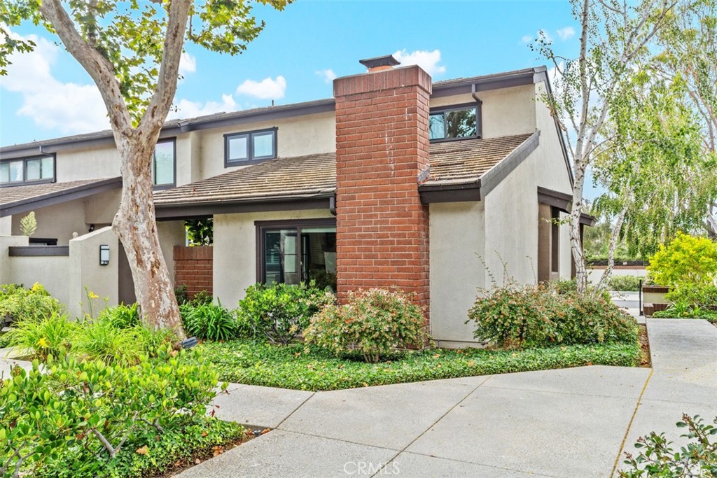 Luxury living is at its finest when you’re at the “Old Ranch” Townhomes in Seal Beach! You’ll love the open and spacious floor plan with approximately 2300 Square Feet of luxury living…featuring 3 large bedrooms plus an in-home office and 3 beautifully remodeled baths! Upon arrival you’ll enter through the home’s private security gate which opens to a large outdoor patio featuring a handsomely tiled patio deck for outdoor enjoyment or extending entertaining opportunities from indoors to outdoor! You’ll love the impressive open floor plan with vaulted ceiling in the living room featuring a gas fireplace and attractive vinyl wood-plank flooring. The dining room’s vaulted ceiling is highlighted with architectural wood-wrapped beams and features a striking custom iron and reclaimed Douglas fir topped handrail plus a built-in buffet with additional storage & serving counter. The kitchen features new appliances including a 5-burner gas cook top, stainless steel refrigerator, dishwasher and a charming breakfast nook. Enjoy the outdoor patio from the kitchen, perfect for BBQing while enjoying a scenic view of the Old Ranch Country Club & Golf Course! Three generous size bedrooms & bathrooms and one on each level of this beautiful townhome. The Primary Suite features a large walk-in closet & storage, plus the Primary bath has a separate shower and tub, and two vanity sinks! A large upper level “bonus closet” that you don’t want to miss, it can serve so many purposes, such as storage, additional walk-in closet, converted office… there are unlimited possibilities. Notable amenities to the home: Dual pane windows, central air conditioning, new carpet, new vinyl wood-plank flooring, smart-lock rekeyable key set on all exterior doors and patio gate, new garage door opener w/exterior keypad and smartphone features, 2 car attached garage and so much more! Owners enjoy the community pool, spa, clubhouse, and lushly landscaped and manicured grounds. Highly acclaimed Los Alamitos School District! You must see it to believe it!!!