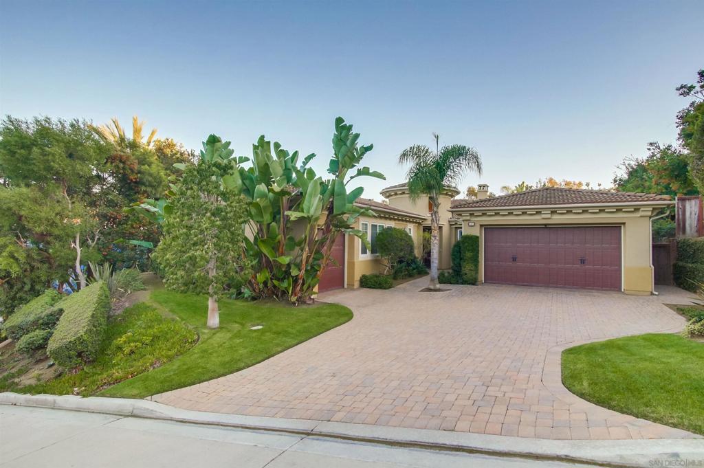 Welcome to this special home in the heart of Encinitas. It’s a former model home sitting on the largest lot in a quiet 12-home community tucked away on a private road — and it’s less than a mile from Moonlight Beach.Step inside and you’ll immediately notice the soaring ceilings and bright, open layout that make this home feel spacious and welcoming. The 20-foot entryway and 10-foot ceilings throughout create a true sense of volume and flow. There are also three fireplaces that add warmth and character. The original owner installed a 15-panel owned solar system in 2022; grandfathered for NEM3 credit. Plus, the property is smart-alarm enabled for peace of mind. One of the standout features of this home is that it’s a single-story residence — all on one level. That means no going up and down stairs, and the overall footprint is larger than most two-story homes, making the living spaces feel even more open and connected. The thoughtful floor plan is designed with two separate wings: the primary suite on one side and the other bedrooms on the opposite side for extra privacy. The primary suite includes dual walk-in closets, a sitting area with its own fireplace, and direct access to the backyard. The granny suite features a private entrance, walk-in closet, and full en-suite bath, making it ideal for extended family, guests, or a privateoffice. In the back bedrooms, you’ll also find Hunter Douglas blinds, a high-end touch that adds both beauty and function.  The chef’s kitchen has GE Monogram appliances, dual convection ovens, a griddle, warming drawer, pot filler, and hidden spice racks built into the range columns. A butler’s pantry and secured wine room are conveniently nearby, making hosting effortless.In the family room, custom windows frame a tranquil waterfall feature in the backyard — a perfect spot to relax or gather with friends. The home is also equipped with two HVAC zones, allowing you to set the perfect temperature in different areas of the home. Parking is a breeze with two separate garages that fit three cars total, plus a driveway that comfortably holds four more vehicles. And with ample private street parking for guests, you’ll never have to worry about space when entertaining. This property brings together coastal living, privacy, and smart design, all just minutes from the beach, great restaurants, and everything Encinitas has to offer. Low fire risk property as government determined (see confidential remarks and Documents for information)