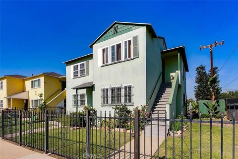 Photo of 2115 W 102nd St, Los Angeles, CA 90047 (MLS # PW26021671)