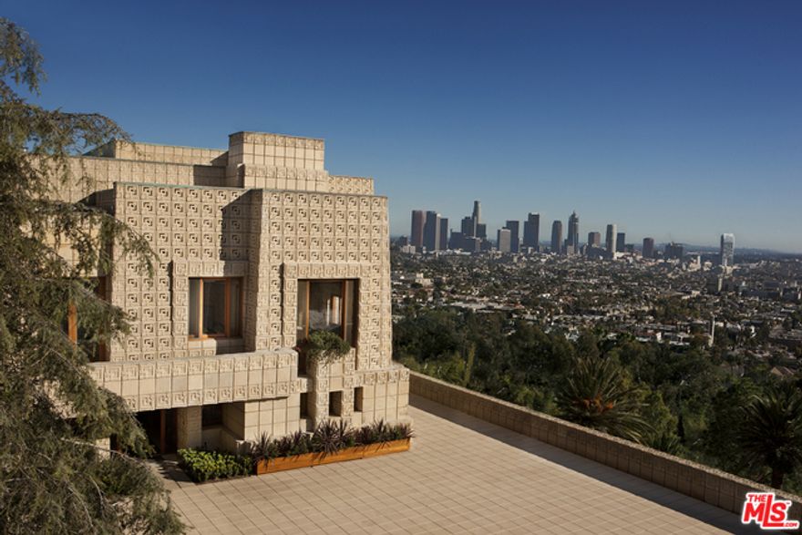 The ENNIS HOUSE, designed by legendary architect Frank Lloyd Wright.  One of the most iconic and important residential properties in America.  Occupying a majestic Los Feliz hilltop with staggering views from downtown Los Angeles to the Pacific Ocean, this remarkable property has undergone years of thoughtful restoration.  Brilliantly proportioned rooms flow effortlessly from one to another.  4 bedrooms (including guest apartment over garage), 3-&#195;&#8218;&#194;&#189; baths, screening/billiard room, guest house and pool.  It is both powerful and remarkably livable.  There are only a handful of residential properties in the world as awe-inspiring as The Ennis House.  Offered furnished. See agent for square footage breakdown.