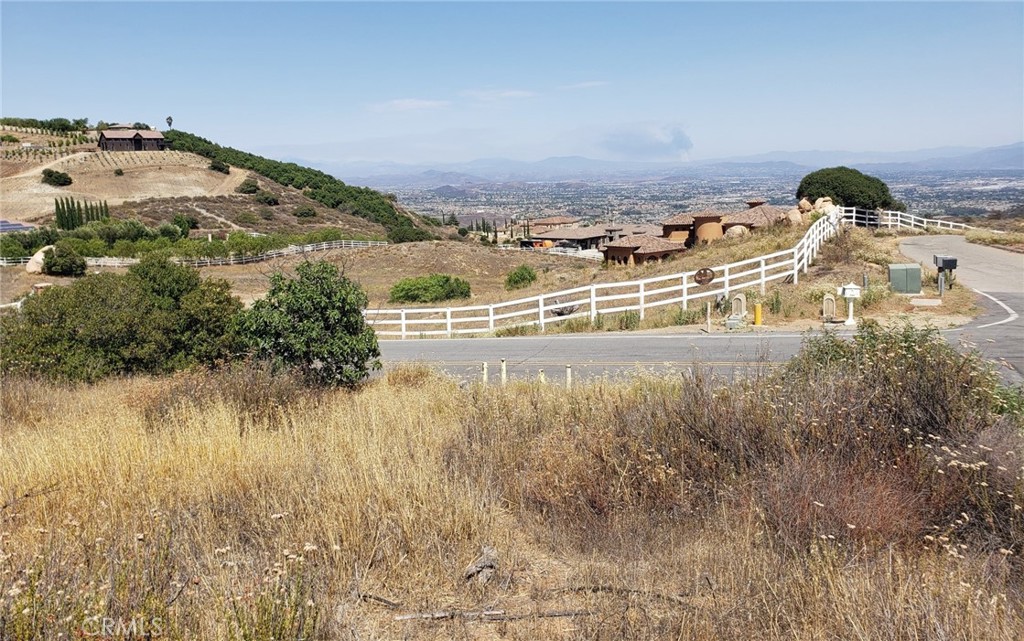**Captivating 8.99 Acres of Vacant Land with Breathtaking Views!**
Welcome to your dream canvas. This expansive 8.99-acre parcel of vacant land offers an unparalleled opportunity for those seeking to build their perfect retreat. Panoramic views of snow-capped mountains, city lights at dusk, and endless horizons that stretch as far as the eye can and nearly 9 acres at your disposal, the possibilities are endless. Whether you envision a private estate, a serene getaway, or an eco-friendly sustainable home site, this land provides ample room for your ideas to flourish.
Take in the breathtaking vistas that surround you. From majestic mountains dusted with snow to the sparkling lights of the city below, this property is a visual feast.
The property is equipped with a 1.5-inch water meter, fire hydrant, and electrical utilities are available at the property line, making the building process smooth and efficient.
The land features prime building pad potential to maximize the stunning views and to provide a spacious foundation for your dream home.
Located in a serene area yet conveniently close to urban amenities, this land seamlessly combines the best of both worlds. Explore nearby hiking and biking trails during the day and return to the peaceful solitude of your property at night.
This is more than just a piece of land; it’s a lifestyle choice. If you're looking for a tranquil retreat away from the hustle and bustle, a place where you can truly connect with nature and enjoy stunning views, look no further. With the perfect combination of natural beauty and accessibility to city conveniences, this property is an exceptional opportunity for visionaries, dreamers, and builders alike.
Don’t miss your chance to own this breathtaking land with spectacular views and all the essential utilities ready for your dream project. Schedule a private tour today and discover the endless possibilities waiting for you on this remarkable 8.99 acres!