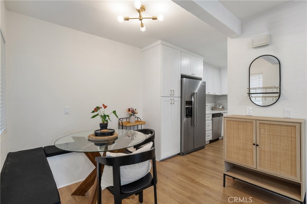 Beautiful Single Level Condo in much sought after Diamond Bar Tennis Club Community. 24 Hour Guard Gated with 3 Swimming Pools, 4 Tennis Courts and Club House. Very Secure with Assigned Parking for 2 CARS IN SIDE BY SIDE COVERED CARPORTS near the property. This lovely End Unit Ground Floor Condo has Recently been Upgraded with Luxury Vinyl Flooring, New Interior Paint, Smooth Ceilings, New kitchen cabinets, Kitchen countertops, Backslash, New Kitchen Light Fixture, New Faucet, New Dishwasher, New Dining Room Chandelier, New Water Heater and New Blinds Throughout. The Bathroom has been completely remodeled with gorgeous subway tile, a soaking tub, new vanity, and new plumbing fixtures. This Spacious Condo features Inside Laundry Hook-Ups, Private Patio and Loads of Natural Light. Monthly HOA covers water, trash, 24 hour security guard, maintenance of the grounds and common facilities. This community is located close to markets, restaurants and shopping centers and Sycamore Park, making it the most desirable community in Diamond Bar. Conveniently located close to the 60 and 57 freeways, near Diamond Bar Golf Course, library and other facilities. Please note: Unit 115 is located in a Premier Location within the community with very few steps and close to the Covered Carport and side by side parking.