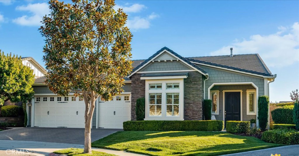 Experience the charm of this English Coastal Cottage blended with executive-level luxury, located at the end of a quiet cul-de-sac at the prestigious Monarch Dunes Golf Course Resort. This stunning Morro Model home offers approximately 2,812 square feet of thoughtfully designed living space on a generous 9,474 square foot pie-shaped lot. With 3 spacious bedrooms, 2.5 bathrooms, a formal dining room and gathering nook with a dual-sided fireplace, this home is tailored for both comfort and entertaining. Step outside into an oversized, professionally landscaped backyard oasis designed to accommodate fabulous outdoor living. Highlights include a custom built-in barbecue, putting green with turf grass, large outdoor spa, mature trees, and a covered patio—perfect for warm summer nights and holiday celebrations. The open floor plan is bathed in natural light from expansive windows, offering panoramic views of the golf course and breathtaking sunsets from the moment you step through the front door. The kitchen is designed to be the heart of the home, and features Monogram stainless steel appliances including double ovens, a built-in side-by-side refrigerator, gas cooktop, microwave, slab granite countertops, a large center island and two walk-in pantries. The great room and den provide ample space for gatherings of any size. When you are ready to relax, primary suite is privately situated at the rear of the home, offering tranquil golf course views and a luxurious ensuite with a large soaking tub, separate shower, dual vanities, custom tile work, and a spacious walk-in closet. With extensive upgrades, including OWNED SOLAR, air conditioning, new water heater, and new outdoor lights, this home offers both elegance and efficiency. Located within Trilogy at Monarch Dunes, this property is part of a vibrant resort-style community that celebrates lifestyle living with world-class golf, scenic trails, fine dining, and engaging social events. Come discover the perfect blend of sophistication, comfort, and coastal beauty.