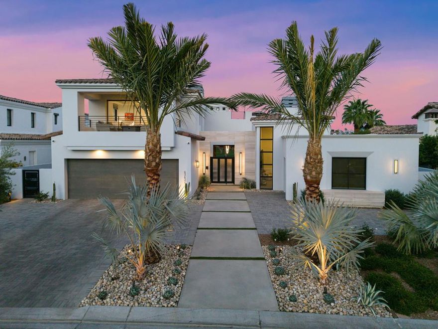 Designed to perfection! The impeccable interior of this gorgeous Hideaway custom home features 5 bedrooms, including a spectacular guest casita, 6.5 baths, home theatre & home gym. The grand courtyard with dramatic fireplace welcomes you into the spacious great room with an expansive bar, perfect for entertaining. Dual pocket doors open to the sparkling pool & spa, BBQ with bar seating, outdoor dining area & firepit. The modern & refined look throughout this 6,429 sf. home gives a unique contemporary feel. The gourmet kitchen, complete with an adjoining secondary kitchen, features premier Dacor appliances, custom cabinetry, quartzite countertops, large island with counter seating & warm natural tile flooring.  The elegant dining room, showcasing a beautiful glass wine wall with storage for up to 550 bottles, makes for ultimate entertaining. The primary suite has soaring ceilings, a cozy fireplace & sitting area with gorgeous views of the 16th fairway of the Pete Dye. The primary bath is outfitted with dual vanities, soaking tub, steam shower, private outdoor shower & jacuzzi, leading to the home gym. The 2nd level boasts 2 guest rooms & luxurious home theatre with premium surround sound. From the roof top deck relax in your private jacuzzi while enjoying views of the surrounding mountains, lakes & golf course. Offered designer furnished per inventory.