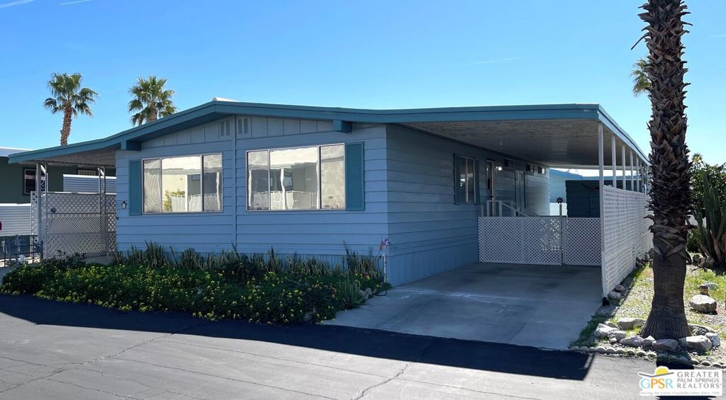 Welcome to the beautiful quaint 55+ community of Corkill Palms. This home is a beauty with several updates and it comes mostly furnished with newer quality furniture. It features 2 bedrooms and 2 baths. Both baths have newer toilets, hand rails and sink faucets. The master bedroom is quite large with attached ensuite. The kitchen features a deeper than normal sink with newer faucet making it easy for washing large items as well as a dishwasher and the gas range and refrigerator are only one year old. The living room is very spacious and wraps around to the dining area with built in China Cabinet. All windows have been tinted to help keep the summer heat out. Ceiling fans are in all rooms as well to circulate air. Several renovations have been done in the past few years. The high efficient HVAC system and Water Heater and Washer and Dryer are only 3 years old. A new fire protected foam roof with a 20 year warranty was installed a little over a year ago which will also help with energy saving. Newer carpeting in bedrooms and attractive wood laminate flooring throughout the rest of the home. There are 2 covered carports with fenced areas for your pet if you have one or for you to relax plus 2 sheds as well as a backyard area. Although this home is on fee land the land it is owed by the park owners and home owners only rent the space the home is on. Space rent is approximately $540 per month and park approval is needed before opening escrow. Buyer to verify with park manager space rent amount and any utility charge amounts passed on to home owners. Relax in the Therapeutic Natural Mineral Springs at the Clubhouse or have some fun on the putting green or in the billiard room located very close by This home is very clean and move in ready. Contact us today to set up and appointment to see this wonderful home!