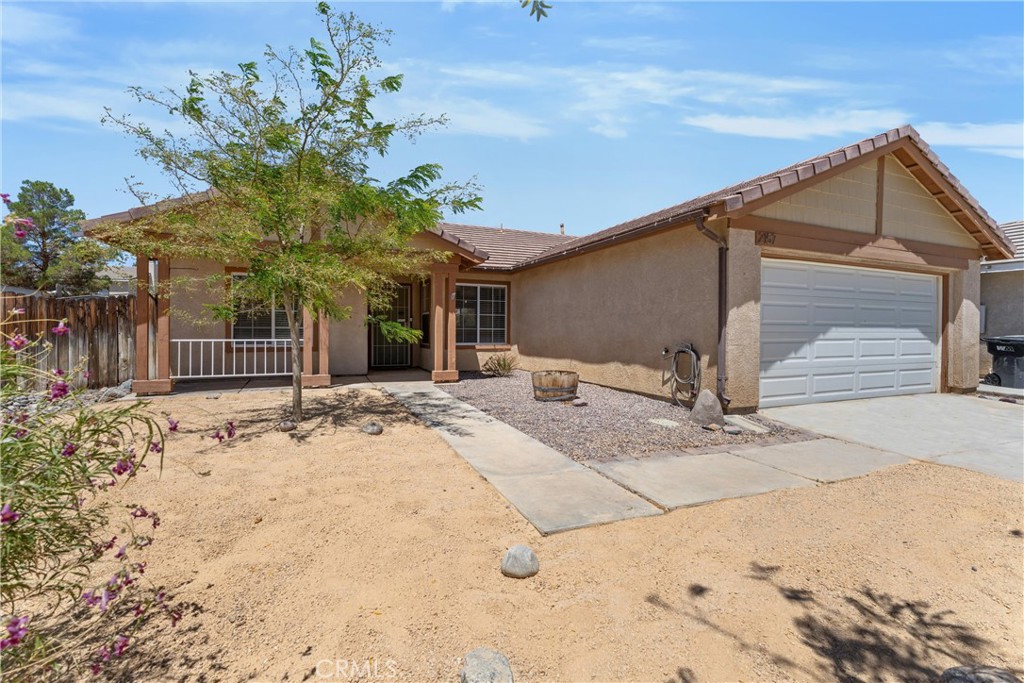 This lovely single story home offers approximately 1400 sq ft of living space though its open floor plan makes it feel like so much more. Its most impressive features include PAID OFF solar panels to save you money, garage is prewired for an EV charger; a huge back yard (over 8,200 sq ft) with a covered patio and drought tolerant landscaping in the front yard for easy maintenace and a reduced water bill. It offers 3 bedrooms and 2 baths with a primary bedroom that has an expansive walk in closet; the bright kitchen opens to a large living room with laminate flooring and fireplace; and the laundry room has tons of storage space. This beautiful home is conveniently located just minutes from the freeway; shopping, dining and an elementary school. Hurry, this one won't last long.