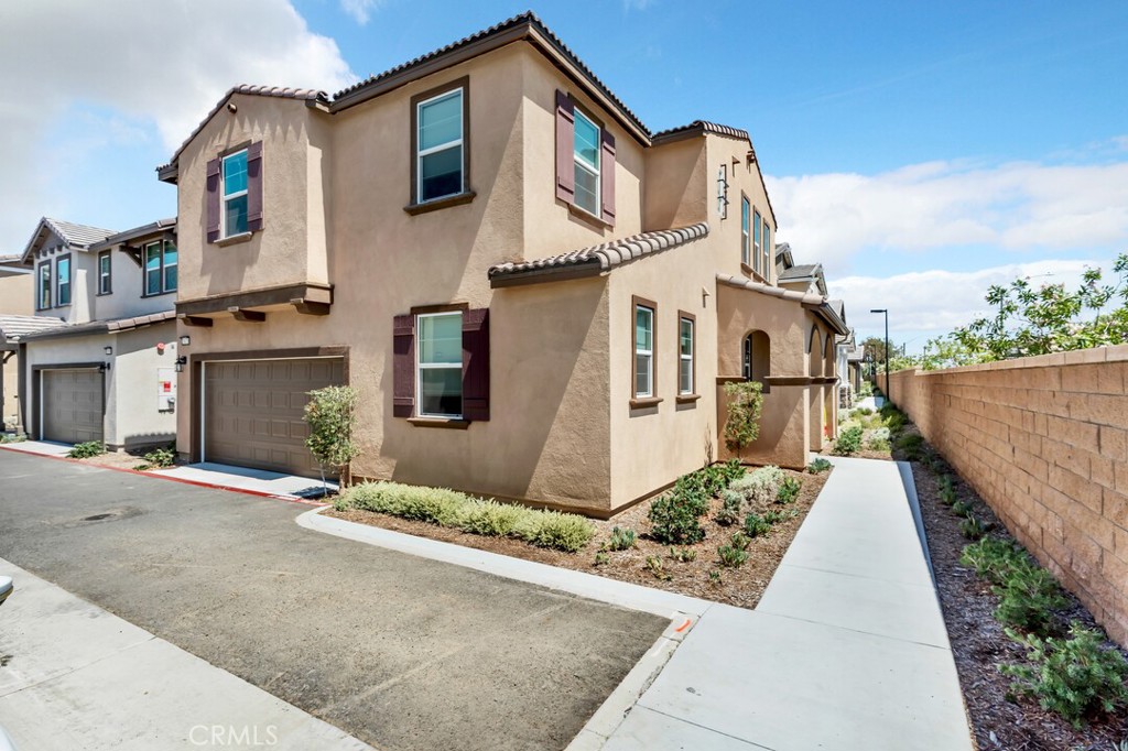Welcome to 28175 Ashtree Drive in the highly sought-after Valiant at Heirloom Farms community! This beautifully designed 3-bedroom, 2.5-bathroom home offers 1,883 sq ft of modern, energy-efficient living with PAID OFF SOLAR in the heart of Temecula. Step inside to an open-concept main floor with a spacious living area that flows seamlessly into the updated kitchen, complete with white shaker cabinets, granite countertops, a large island, and stainless steel appliances. Low maintenance private outdoor space features turf and deck, making the small yard perfect for grilling and outdoor dining. Durable LVP flooring runs throughout the main level, while carpet adds warmth upstairs. Expansive primary suite features a walk-in closet and a spa-like ensuite bathroom. Two additional bedrooms, a full bathroom, and a conveniently located upstairs laundry room complete the second floor. This home is thoughtfully upgraded with recessed lighting, dual-pane windows, and a two-car attached garage. As part of a vibrant, amenity-rich community, enjoy access to a resort-style pool, spa, dog park, playgrounds, and scenic walking paths. Located within the award-winning Temecula Valley Unified School District and just minutes from shopping, dining, parks, and wine country, this move-in-ready gem has it all. Don’t miss your chance to own a stylish, low-maintenance home in one of Temecula’s premier new communities—schedule your private tour today!