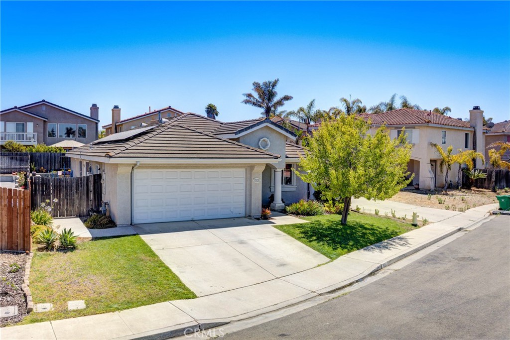 Welcome to 1824 Amy Way, a well-cared-for single-level home tucked away on a quiet cul-de-sac in Santa Maria. With 3 bedrooms, 2 bathrooms, and 1,398 square feet of living space on a 5,227 sq ft lot, this home offers great potential with lots of functional space to make your own. Inside, you'll find high ceilings, a cozy gas fireplace, and a spacious open-concept living and dining area. The kitchen has tile countertops and nearly-new stainless steel appliances (less than 3 years old). All the windows feature custom blinds, and the layout feels bright and open throughout. The primary suite includes a dual-sink vanity, large walk-in closet, and direct access to the backyard through a sliding glass door. There’s also indoor laundry, a 2-car garage with an EV charger, and a good-sized backyard with a patio, great for BBQs or relaxing in the sunshine. The yard is equipped with French drains and sprinklers throughout for easy maintenance. Located in an established neighborhood close to schools, parks, shopping, and walking trails, including a nearby man-made lake that’s perfect for evening strolls. You’ll also love the quick freeway access for an easy commute or weekend getaway, and the added peace of mind being near the local CHP office. This move-in ready home offers both comfort and functionality and is ready for a new owner.
