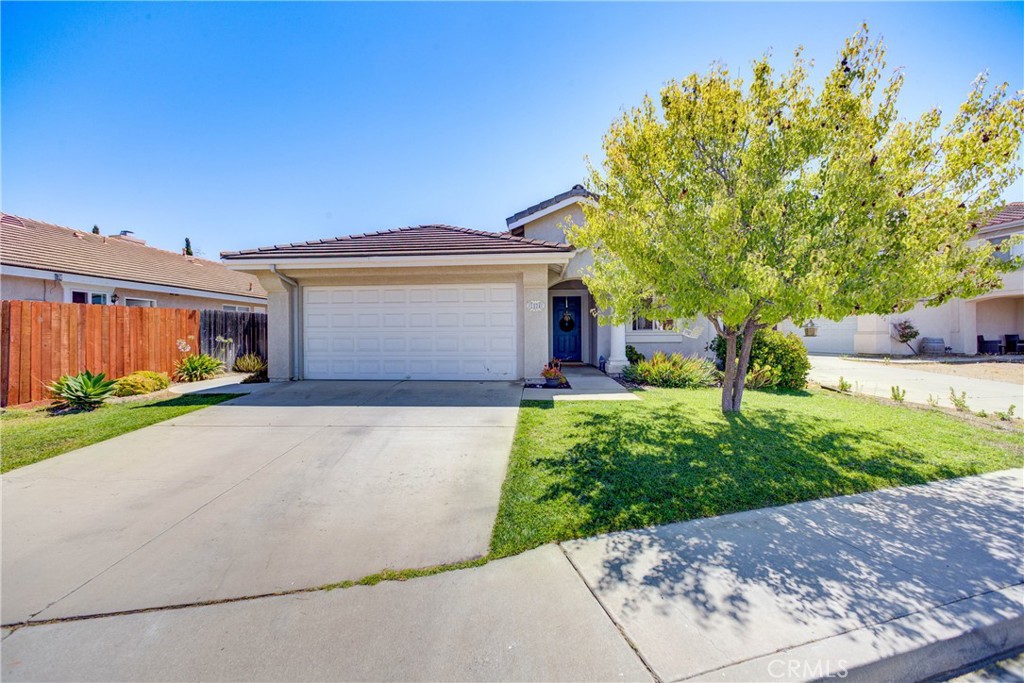 Welcome to 1824 Amy Way, a well-cared-for single-level home tucked away on a quiet cul-de-sac in Santa Maria. With 3 bedrooms, 2 bathrooms, and 1,398 square feet of living space on a 5,227 sq ft lot, this home offers great potential with lots of functional space to make your own. Inside, you'll find high ceilings, a cozy gas fireplace, and a spacious open-concept living and dining area. The kitchen has tile countertops and nearly-new stainless steel appliances (less than 3 years old). All the windows feature custom blinds, and the layout feels bright and open throughout. The primary suite includes a dual-sink vanity, large walk-in closet, and direct access to the backyard through a sliding glass door. There’s also indoor laundry, a 2-car garage with an EV charger, and a good-sized backyard with a patio, great for BBQs or relaxing in the sunshine. The yard is equipped with French drains and sprinklers throughout for easy maintenance. Located in an established neighborhood close to schools, parks, shopping, and walking trails, including a nearby man-made lake that’s perfect for evening strolls. You’ll also love the quick freeway access for an easy commute or weekend getaway, and the added peace of mind being near the local CHP office. This move-in ready home offers both comfort and functionality and is ready for a new owner.