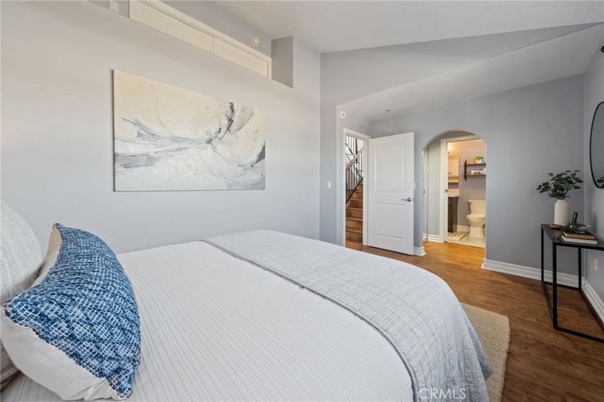 This 3-bedroom, 2.5-bath townhome in the South Bay qualifies for a $20,000 assistance grant that you don't have to repay. It also just might check every box you didn’t even know you had. Love natural light? You’ll get plenty, thanks to the generous windows that seem to know exactly when to let the sunshine in. Prefer your fireplace to be low-maintenance? One click, and you’re in cozy mode. 
The kitchen is practical and polished, with granite countertops, stainless-steel appliances, and a cheerful garden window that practically begs you to grow basil, even if your green thumb is more of a hopeful hue.
All three bedrooms are upstairs where they belong, including a primary suite with vaulted ceilings and a fully updated en-suite bathroom that whispers “relax” every time you walk in. There’s also a second full bath, a linen closet, and just enough hallway to make the upstairs feel open but not echo-y.
Head up one more flight and you’re on your private rooftop deck, with sweeping views of the Pacific Palisades, DTLA, and possibly your future self enjoying sunsets with a glass of something cold.
The home includes a 2-car garage with storage, guest parking, an in-unit laundry closet (because nobody misses coin-op machines), and a small, self-managed HOA that keeps things running smoothly without micromanaging your life. All appliances stay, and major updates were made in 2025 including new windows and a new HVAC system, so you can move in and start living.
Plus, you're just 6 miles from the beach!