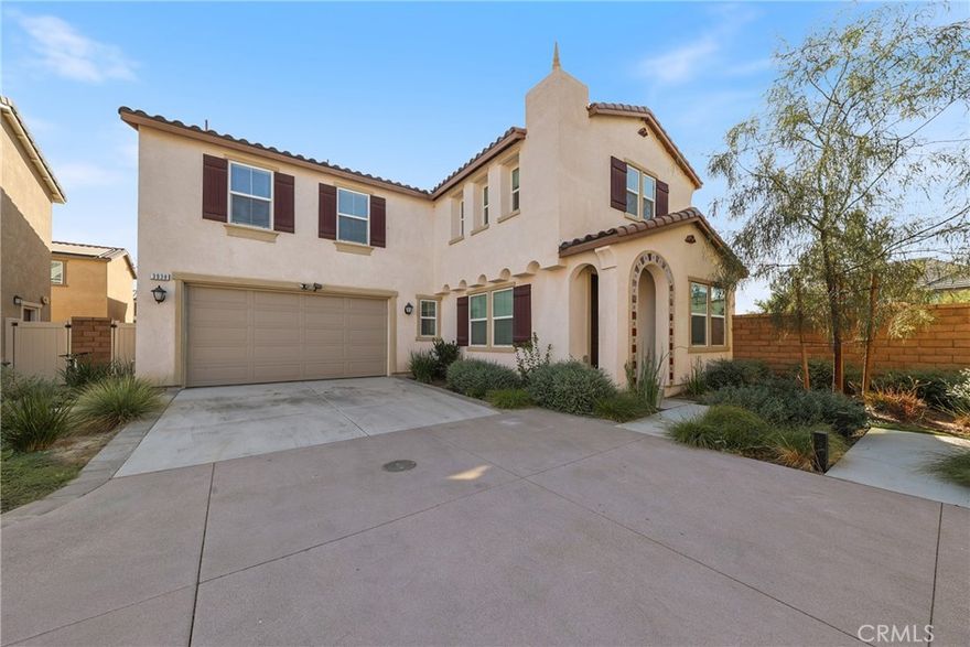 The property offers a spacious and modern living experience with 2,780 square feet of living space on a 3,706 square foot lot. This stunning 5-bedroom, 3-bath home features a convenient downstairs bedroom with a full bath, ideal for guests or multi-generational living. As you enter, you'll find an office/library room, followed by an open floor plan that includes a living room, dining area, and kitchen. The kitchen boasts white cabinets, stainless steel appliances, and grey quartz countertops. Upstairs, The expansive master bedroom features a walk-in closet and a master bath with a spa tub, separate shower, and dual vanities and a well-appointed laundry room and a versatile loft space perfect for a home office or entertainment area. The home includes a 2-car attached garage, providing ample storage and parking. House has solar panels and paid off. Additionally, it is located within minutes of The Station Shopping Center, offering a Costco, 99 Ranch Market, In N Out Burgers, Starbucks, and many more restaurants and conveniences. The HOA includes a private park with many amenities for your enjoyment.