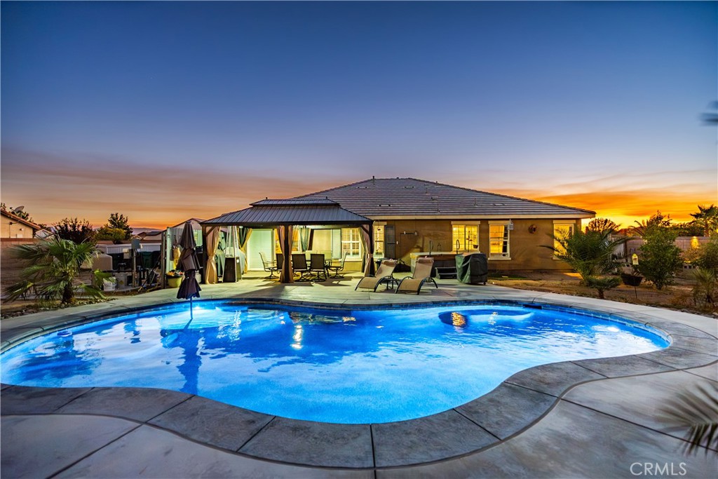 ***LIVE BEAUTIFULLY*** POOL HOME! Welcome to this 4-bedroom, 2-bath home with an additional bonus room, offering nearly 2,000 sq. ft. of comfortable living space. Built in 2011 and situated on over half an acre, this property features a sparkling pool, and a three car garage and RV access! Step inside to find plantation shutters throughout, a spacious kitchen with granite countertops, stainless steel appliances, and plenty of cabinetry. The inviting primary suite includes a large walk-in closet, dual vanities, and the primary bath with a separate soaking tub and shower. The outdoor space is perfect for entertaining or relaxing. Enjoy a massive backyard complete with a sparkling pool, ideal for hot summer days. RV access and a 3-car garage provide plenty of room for vehicles, toys, and storage. Don’t miss the chance to own this East Lancaster gem—where comfort, convenience, and style come together in one incredible property.