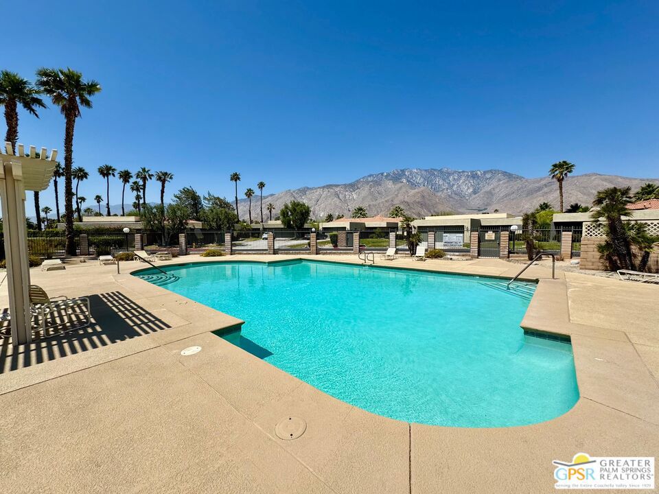 Make your dream a reality! You only live once! Buy in a gated community with lots of resort-style amenities in beautiful Palm Springs! Tired of the Cold? Tired of traffic in the big cities? Palm Springs is a great place to live. Everything is so close: very little traffic, great healthcare services, easy to get around, lots of things to do, a great international airport in less than 15 minutes, and sunny weather all year around. Amazing price for only $298k furnished/turnkey or unfurnished (same price) for a one-level duplex-style condo that does not have a condo above or below you and has a private garage and a private backyard. A bright, 2-bedroom, 2-Bath Large Corner Lot Duplex with beautiful views of the mountains is situated in a well-maintained gated community of Sunrise Palms, just 10 minutes from vibrant downtown Palm Springs with great shops, restaurants, and much more. This 2-bedroom, 2-bathroom duplex offers natural light, privacy, and a very nice layout that truly feels like a home. The master bedroom has an en-suite bathroom, and the second bedroom is currently being used as an office and has a pull-out futon-style sofa for guests. The futon-style sofa in the living room also pulls out to a bed. Solar tubes for natural lighting throughout. This duplex has 2 bathrooms, which is a great upgrade. Many of the duplexes in the community do not have 2 bathrooms. New light oak laminated wood floors throughout. Step into your private backyard oasis, perfect for sun, entertaining, gardening, yoga, reading and enjoying peaceful desert evenings. Artificial grass in the backyard for easy maintenance. One of the 8 pools and 8 spas is around the corner and less than 2 minutes' walk from the duplex. Leased solar panel with a remaining 15-years and an average monthly cost of $55 to $100 depending on usage. You will save a lot of $$ on AC costs due to the solar panels. Private backyard gardening costs (optional) once a week for a monthly cost of $100.00. HOA fees are $537 a month, which includes the $50.00 monthly Indian Land Lease Fee. The monthly HOA includes water, trash, roof, onsite management Monday through Friday, and gardeners/landscaping for the common areas. The covered patio extends your living space outdoors for additional square feet of outdoor living space. The private garage adds security and convenience. 1 car for the garage and an additional car in front of the garage. The current car in the garage is a large 4-door Jeep Wrangler. Additional guest parking in the community. Whether you're looking for a full-time residence or a second home to escape for some fun, sun, rest, tennis and swimming. This duplex is also a good 1031 exchange/rental investment property. Rental income potential is strong, with 1-year leases averaging $2,500/month, unfurnished and/or furnished short-term rentals (30+ days) bringing in up to a potential of $3,500/month. Sunrise Palms Gated Community sits on 57 lush acres, featuring 360 duplex-style homes. Resort-style amenities include 8 swimming pools, 8 Jacuzzis, 2 tennis courts, 2 pickleball courts, 2 basketball courts, and even a putting green, ideal for active lifestyles and relaxed living alike. Pet-friendly (max 3 pets allowed), a community with lots of areas to walk your dogs, and a private park to have fun with your dogs. Many residents stay active and healthy by walking daily around the community. Great community for biking. All ages are welcome. Los Angeles is less than a 2-hour drive away. Flights to the Palm Springs International Airport from many cities. Only a 1 hour and 35 min flight from San Francisco. The duplex is in good condition. The buyer will need to buy as is. Showings only for serious and qualified buyers. The only entrance is on Frances and Hermosa. Welcome to your new home!