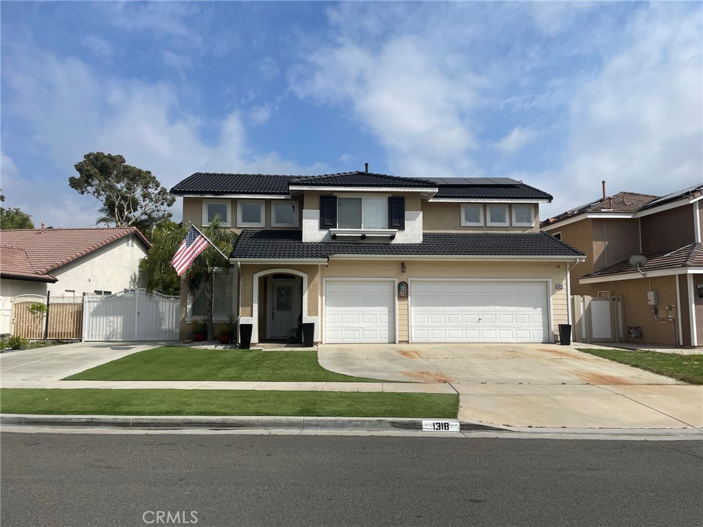This beautifully appointed 4-bedroom, 2.5-bath, 2,100 sq ft home blends modern upgrades with everyday convenience. Designed for both comfort and style, it features SOLAR, a water softener, and thoughtfully updated finishes throughout. Step inside to a bright, open living space perfect for relaxing by the cozy fireplace. The recently upgraded kitchen boasts new quartz countertops, a farmhouse-style stainless steel sink, and stainless steel appliances, making it a chef’s delight. Travertine flooring flows through the lower level, while luxury plank vinyl adds warmth and durability upstairs. There is also a loft area that was added on. Outdoors, the expansive 10,454 sq ft lot is an entertainer’s dream featuring a sparkling pool and spa, outdoor kitchen, firepit, and putting green. Enjoy ample RV parking with sewer dump, a storage shed, and a large 3-car garage for all your parking and storage needs. Nestled in a family-friendly neighborhood with excellent schools, you’re just minutes from the 91 and 15 freeways, shopping centers, and dining—making this the perfect place to call home.