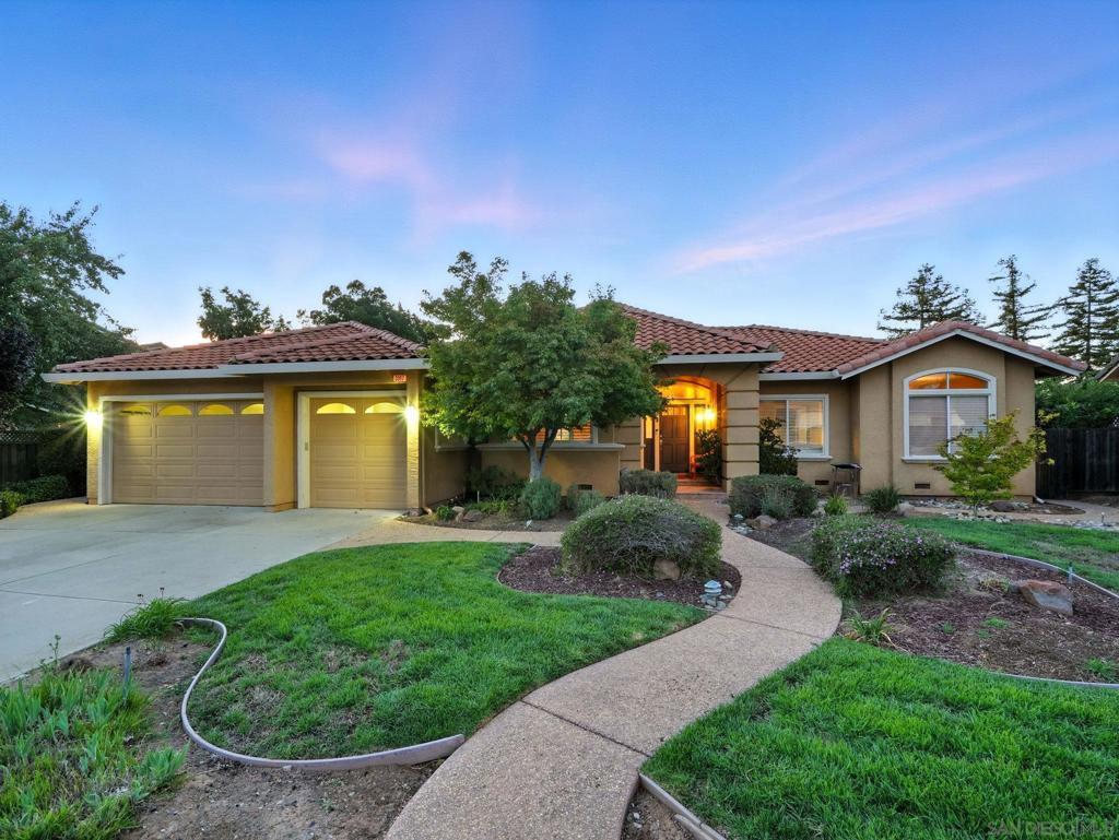Stunning Evergreen home in the prestigious Meadowlands community! This single-story 5 bed, 3.5 bath residence offers ~3,294 sq ft of open living space on a spacious 17,860 sq ft lot (.41 acres) with breathtaking foothill views, high ceilings, and a seamless indoor-outdoor flow. Recent upgrades include new hardwood floors in the living, dining, and three bedrooms. The chef’s kitchen features granite counters, tumbled marble backsplash, stainless appliances, and opens to a large family room with built-in media center and custom lighting. The elegant primary suite boasts a spa bath with soaking tub, walk-in shower, and dual vanities. One bedroom includes a private entrance, yard access, and a built-in office setup—perfect for guests, in-laws, or remote work. Custom organizers throughout offer excellent storage and function. The resort-style backyard features a pool, spa, gas fire pit, outdoor kitchen with upgraded counters and built-in BBQ, and a new gazebo with lighting, speakers, and heating. A large concrete pad offers great ADU potential. Impeccable landscaping and hardscaping, plus 10 mature fruit trees including apple, Korean pear, lemon, jujube, kumquat, and banana. Solar lease in place. 3-car garage. Top Evergreen schools including Silver Oak Elementary and Evergreen Valley High. No HOA. Move-in ready!