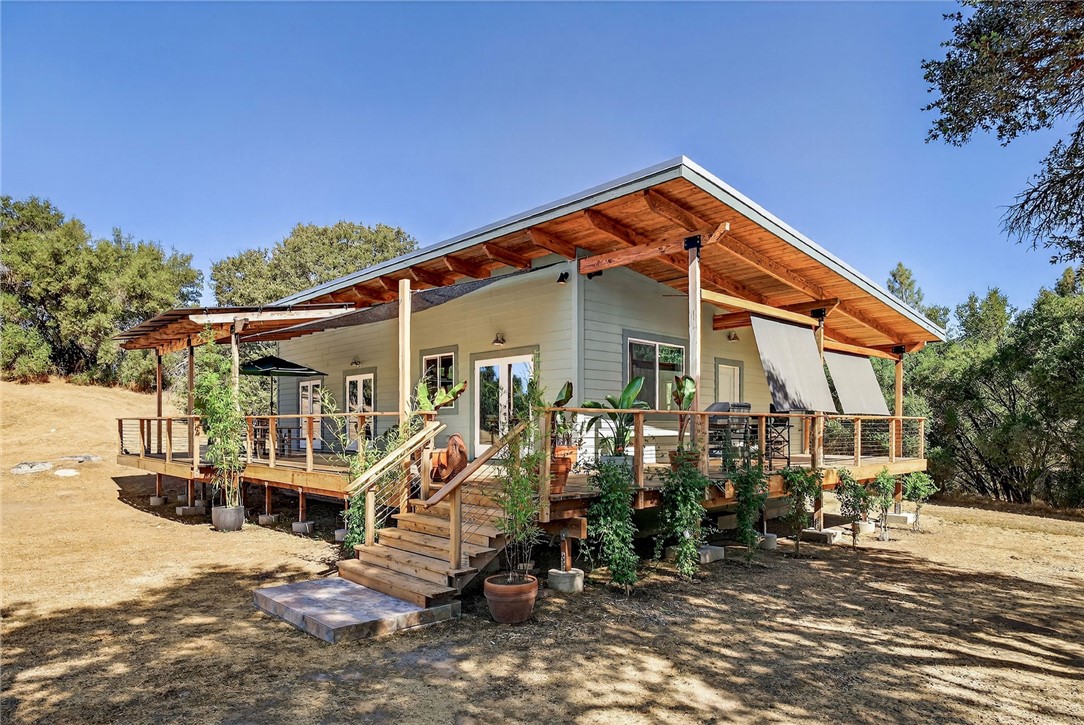 Incredible opportunity to own two adjoining, fully improved and permitted parcels totaling
nearly 14 private acres just minutes from the town of Mariposa, Gateway to Yosemite! This
one-of-a-kind property includes a brand-new 2 bed, 2 bath Craftsman Style home featuring
open beam ceilings, hickory flooring, cherry wood cabinetry, gas range and wood stove, tiled
baths, an efficient mini-split system and metal roof. The home is built on an elevated
foundation for excellent airflow, access, and insulation, with an expansive 750+ redwood
deck, double-tempered windows, Hardie siding, and a 5kW owned (no lease/loan to assume!)
solar system with microinverters.
The second parcel has its own septic and power, a beautiful meadow, and a seasonal creek. It
includes a prepared building site with adjacent hook ups for power and water and a building
permit from the County. It also includes a permitted 12x34 insulated barn with power and
water and a vinyl floor. Both parcels are zoned for two habitable structures each, with
separate PG&E meters, phone lines, septic systems, and shared access to a high-producing 60
GPM well and 5,000-gallon storage tank. Six months a year there is an active spring providing 2-
10 gallons per minute adjacent to the well. Enjoy complete privacy behind an 800 ft redwood
fence and gate, with full southern exposure, ideal elevation, and a peaceful setting just off
Indian Peak Rd.
Everything is permitted and thoughtfully developed, ideal for multigenerational living, a family
compound, or future expansion.