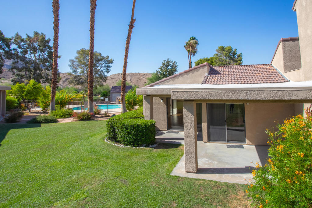 Soak in peaceful mountain views, sunrise or sunset watch the roadrunners and ravens from your living room. Enjoy a morning hike on the nearby trails, this move-in-ready 2 bed, 2 bath Sommerset condo offers the ultimate desert lifestyle. As a bright and private end unit, this home welcomes you through a direct entry from the attached two-car garage into a light-filled kitchen featuring three large windows. The kitchen seamlessly connects to a formal dining area and a spacious living room with soaring angled ceilings and a patio overlooking a lush greenbelt and breathtaking Santa Rosa mountain views. Both bedrooms are en-suite for comfort and privacy. The primary suite features dual mirrored closets, high ceilings, dual vanities, and a walk-in shower. The secondary bedroom also includes a large mirrored closet and private bath access.Located in the sought-after Sommerset community just off Highway 74, you'll enjoy access to 11 sparkling pools, tennis and pickleball courts, and close proximity to the prestigious Stone Eagle Golf Club. Just minutes from Highway 111 and El Paseo's premier shopping and dining--this home has it all!