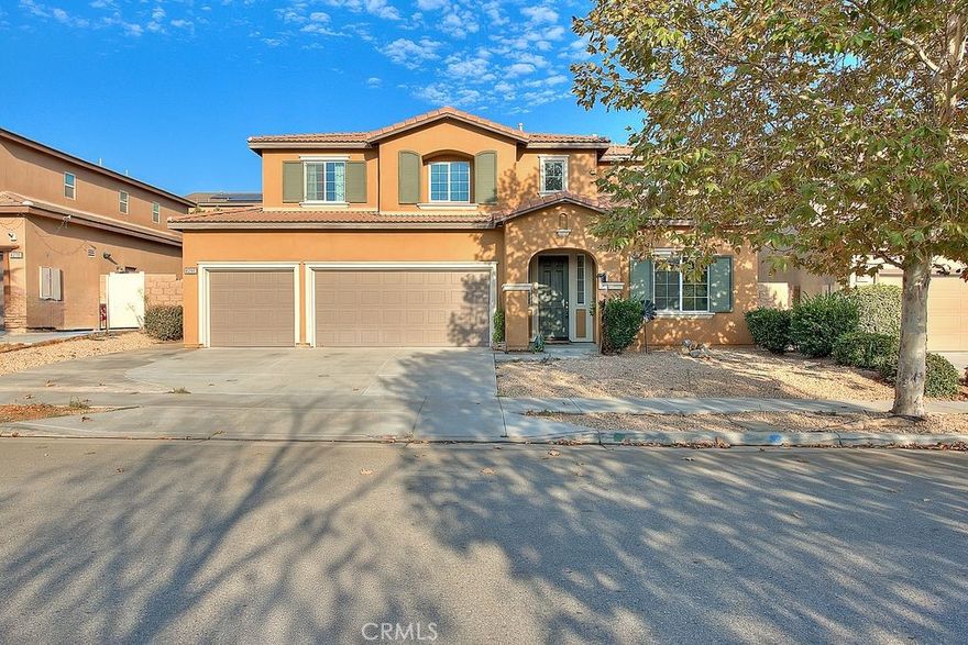Step into a world of endless possibilities with this delightful gem nestled in the prestigious city of Jurupa Valley. This stunning 5-bedroom, 3-bath home spans a generous 3,143 sqft, perfectly blending space and comfort. 

As you approach, a long concrete driveway leads to a spacious 3-car garage, welcoming you home. Inside, the freshly painted interiors and new hardwood flooring create an inviting ambiance that flows seamlessly throughout the downstairs. The heart of the home, the kitchen, features elegant dark wooden cabinets paired with gleaming granite countertops, ideal for whipping up your favorite meals. 

Cozy evenings are best spent in the expansive living room, where a charming fireplace invites warmth and relaxation. The downstairs layout includes a versatile office or separate living room, one bedroom, and a full bath, providing ample space for guests or a quiet retreat. 

Venture upstairs to discover plush carpeting that adds a touch of luxury. A spacious loft awaits, perfect for family gatherings or quiet evenings. You'll find two additional bedrooms, plus your own master suite—a sanctuary complete with a generous walk-in closet and a beautifully designed full bath.

Step outside to a serene outdoor space adorned with concrete flooring and lush foliage, ideal for entertaining or enjoying peaceful moments in nature. , Property is located just south of the 60 Freeway exit Pyrite Don’t let this golden opportunity slip through your fingers—homes like this are a rare find! Make this dream home yours before it’s gone! Step outside to a serene outdoor oasis, where concrete flooring and lush greenery create an ideal backdrop for entertaining or enjoying peaceful moments in nature. Conveniently located just south of the 60 Freeway exit Pyrite, this gem is a rare find that you won’t want to miss. 

(Please note: the property was staged, and furniture is not included.)