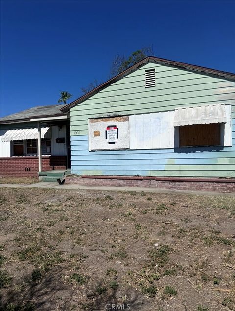 Photo of 560 W Cornell Dr, Rialto, CA 92376 (MLS # DW26066614)