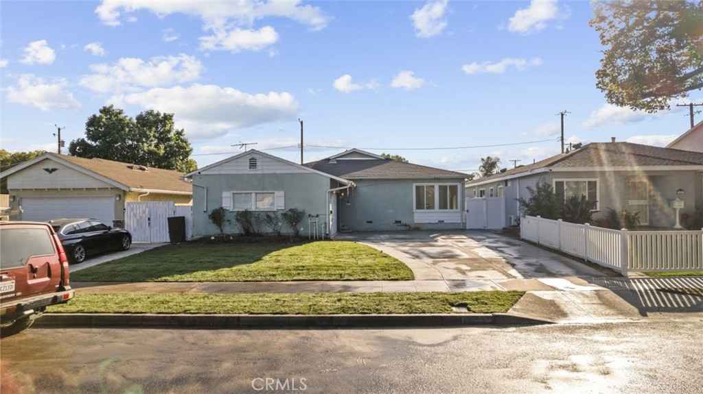 Discover this beautifully updated 3-bedroom, 3-bathroom home offering 1,799 square feet of thoughtfully designed living space on a generous 6,887 square foot lot. Nestled in one of Burbank's most sought-after neighborhoods, this stunning residence blends modern elegance with comfortable, everyday living. The open floor plan welcomes you with bright recessed lighting that accentuates the spacious living and dining areas-perfect for both entertaining guests and relaxing in style. The chef-inspired kitchen boasts sleek stainless steel appliances, sparkling quartz countertops, and abundant cabinetry, offering the ideal space to create culinary delights. A convenient washer and dryer closet adds a touch of practicality without sacrificing style. Sunlight floods every room through large, well-placed windows, illuminating the generously sized bedrooms and spa-like bathrooms. Outside, the meticulously maintained yard is a private oasis, featuring mature trees and plenty of space to unwind or host outdoor gatherings. Completing this exceptional home is a roomy 2-car garage and meticulous upgrades throughout, making this property truly move-in ready. Experience the perfect balance of tranquility and convenience in the vibrant heart of Burbank- close to top schools, shopping, and dining.
