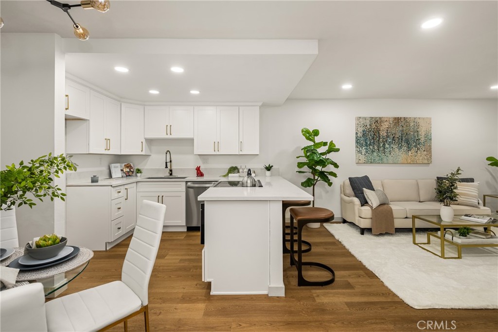 Enjoying the comforts of home should cause you to ask, “Why Go Out?”. We
redesigned this ground floor home with a walk-in shower and open concept living
spaces so that daily living would make you feel special. We have created a space for
you that is Convenient, Elegant, Beautiful, Accommodating, Entertaining and Easy to
Clean. You’re going to love it. The open concept entertainment style kitchen features a
flush mounted electric range at counter height that keeps you connected to your guests
and lets you enjoy watching tv while cooking in the kitchen. We wanted you to have
access to lots of counter space so we built in a top loading Microwave drawer that can
be used as an oven or a warming drawer. We had so much fun opening and closing it
with one touch that we know you will, too. It may be the only cooking appliance you use
in the kitchen because it’s just so much fun to use. The home is spacious enough to
host family and friends and cozy and convenient enough for those private moments
where you just want to relax and sip black coffee in bed. There are so many options for
you to enjoy and too many upgrades to list here so we provided a sheet that has a
partial but comprehensive list for you to review.
This particular unit is just across the walkway from the entrance to the gym, pool,
laundry room, and mailboxes. You don’t have to use any steps if you don’t want to. It
comes with its own garage and you may request one additional assigned covered
parking space.
All of the units here at Park Ridge are conveniently located across the street from the
Lake at Craig Park, a few short minutes from shopping, restaurants and services, and
about a mile away from Cal State University Fullerton. We all enjoy a resort style pool
and hot tub with a very well equipped gym, private tennis courts and a basketball hoop.
Finding a well designed home like this with everything already done for you, however, is
about as rare as winning the lottery. This one won’t last long. It has better quality
upgrades than most newly built homes. Call now before this one gets away.
***Additional Assigned Covered & Uncovered Parking Space Is Available Through The Property Management Company***