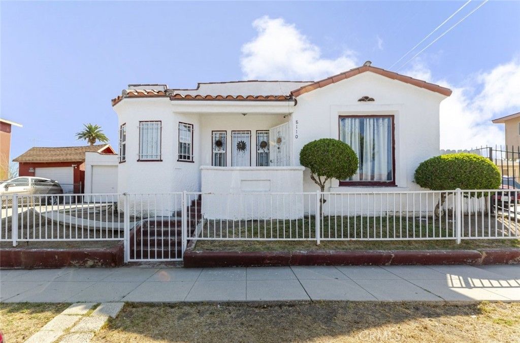 Photo of 8110 S Halldale Avenue, Los Angeles, CA 90047 (MLS # DW25224860)