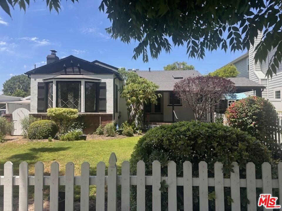 Colfax school district. Adorable cottage like 3 bedroom 1.5 bath. Freshly painted and updated. Amazing neighbors on perhaps the best street in Los Angeles. Friendly, throw block parties, decorate for major holidays. Appliance warranty. Tenant pays only $75 to warranty co per request. Application Fee: Deposit Fee $5500 plus 1st month's rent. Central Air Conditioning Dishwasher Dryer Fenced in yard. Flooring: Hardwood Freezer Heating system: Forced Air Landlord pays for gardener to cut grass Laundry: In Unit Microwave Oven No Utilities included in rent Refrigerator Security system if tenant wants to use Washer. This is a lovely home Will go quite fast Call if interested