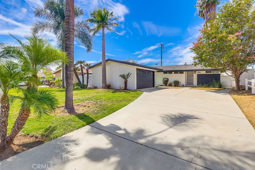 Welcome to this beautifully remodeled 4-bedroom, 2-bath home, thoughtfully designed with modern updates.Soaring vaulted ceilings and an open-concept layout fill the home with natural light, creating a warm and inviting atmosphere perfect for both entertaining and everyday living. The spacious bedrooms and updated bathrooms offer comfort for the whole family. The updated kitchen includes modern appliances, sleek countertops, and plenty of cabinet space. Step outside to a nicely sized backyard, ideal for outdoor dining, play, or simply relaxing in your own private retreat. Recent upgrades include a fully renovated kitchen with new cabinets and counters, a new roof, and a brand-new AC unit. This home is nestled in a desirable neighborhood near top-rated schools, this move-in ready home combines convenience, comfort, and value.