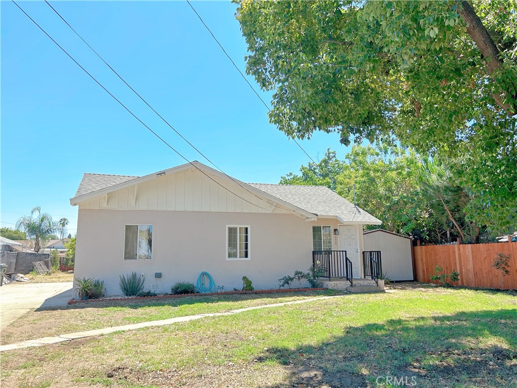 Discover this fully renovated 2-bedroom, 1-bath single-family home with a bonus room — perfect for a small family! Enjoy brand-new finishes and stylish flooring throughout, along with spacious front and backyards, and an extra-long driveway offering plenty of parking. The backyard features a covered patio, ideal for outdoor dining or relaxing. Move-in ready and beautifully updated inside and out!