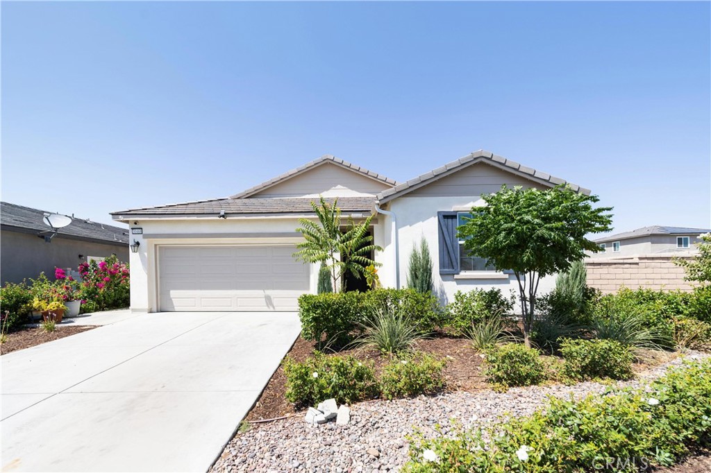 Welcome to this stunning 3-bedroom, 2-bathroom home, perfectly situated on a peaceful cul-de-sac with no side neighbors – offering rare privacy and tranquility. Just two years old, this beautifully maintained property combines modern design with thoughtful details throughout. Step inside to an open-concept layout with abundant natural light, ideal for both everyday living and entertaining. The gorgeous kitchen features stylish finishes, stainless steel appliances, and a large island overlooking the living and dining areas. Enjoy the serenity of beautifully landscaped outdoor spaces, perfect for morning coffee or evening relaxation. The backyard offers room to garden, play, or even add a pool – with enhanced privacy thanks to the unique lot placement. Other highlights include a generous primary suite with a walk-in closet and en-suite bath, PAID solar, two additional well-sized bedrooms, and a two-car garage. Because of the lot size and placement there is potential to add RV parking! Don’t miss your chance to own this exceptional home in a new development. Schedule your showing today!
