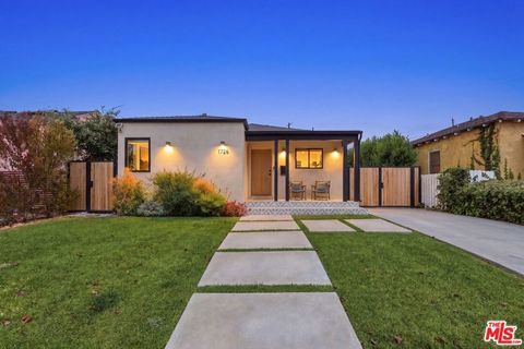 Photo of 1726 S Stanley Avenue, Los Angeles, CA 90019 (MLS # 26837339)