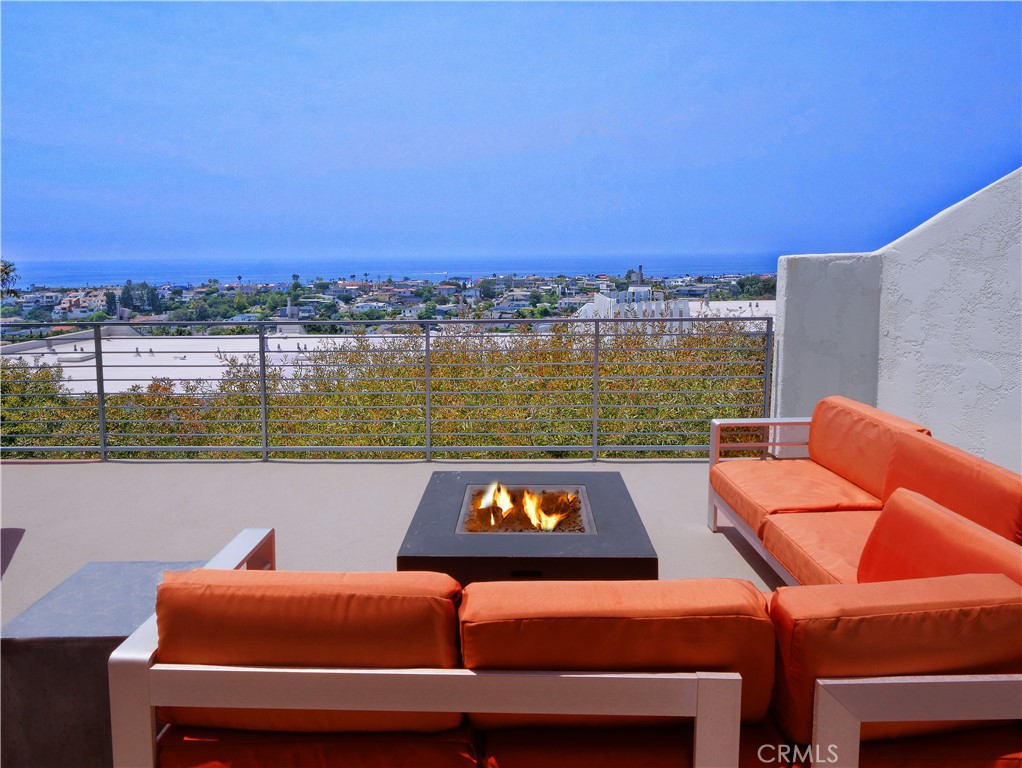 Located in the highly coveted “Sea View Villas,” this gorgeously remodeled townhome has it all. Sweeping ocean views from Catalina to Malibu adorn the entire top floor and are highlighted on the supersized private outdoor deck. This 3 bedroom/3 bathroom townhome is beautifully furnished and is one of the largest in the building with over 1,850 sq ft. Large master suite features a spacious walk-in closet and dressing area. Gourmet kitchen has been fully remodeled and has custom cabinetry, stainless steel appliances and a walk-in pantry. Sea View Villas is a resort community with a pool, heated spa, outdoor eating area and clubhouse - so you'll feel like you are on vacation every day. Plenty of guest parking spots and walking distance to the beach and both downtown Hermosa and Manhattan Beach make this a true gem!