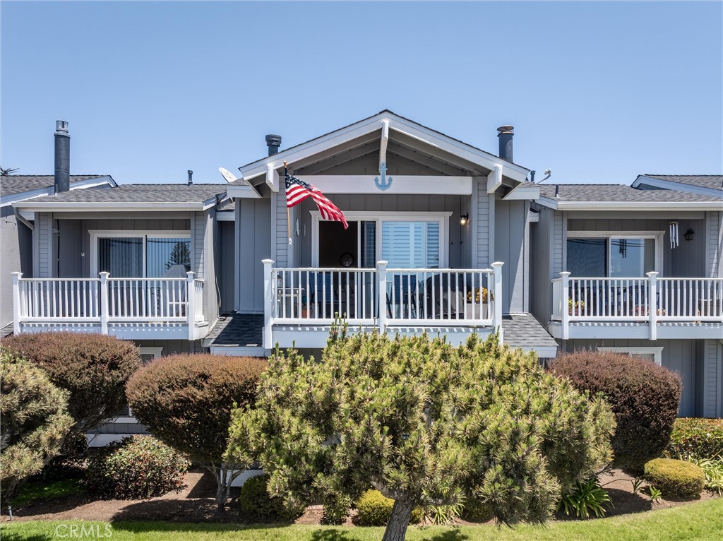 Attention all view lovers! Want to see the Rock, the Stacks and views of the ocean with visible whitecaps from your private balcony? Then look no further! This beautifully renovated and move-in ready 2BD/1.5BA condo is located just moments to the beach in the charming Villa Sequoia community. Step inside to a coastal-inspired interior with thoughtfully appointed modern upgrades. The upstairs is an open-concept living space featuring vaulted ceilings, a cozy gas fireplace, tropical-inspired ceiling fan, contemporary fixtures and views of the ocean. The kitchen has quartz countertops, a new gas stove, a pantry closet, a refrigerator nook, and plenty of storage. Downstairs are two spacious bedrooms located on the entry level, and a fully remodeled bathroom with a sleek tiled shower, and an in-unit laundry closet for added convenience. Plus there is a detached single-car garage, and an additional assigned covered parking space. This fabulous townhome is located minutes from local parks, shops, restaurants, scenic hiking and biking trails, farmers markets, and the downtowns of Morro Bay and Cayucos.