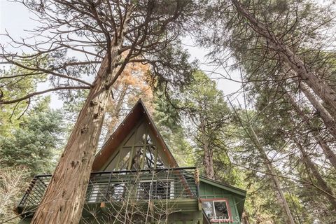 Photo of 911 Kuffel Canyon Rd, Lake Arrowhead, CA 92385 (MLS # IG25232557)